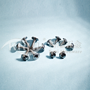 The KR012- cross trough flat round head flange surface from attacks sews DIN968